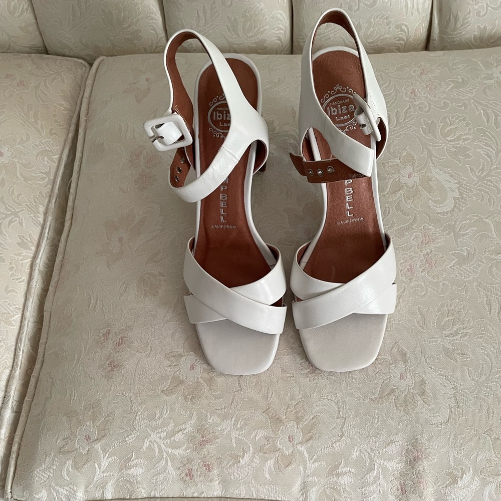 Jeffrey Campbell size 9.5B white leather open toe, open back 4” heel shoes.